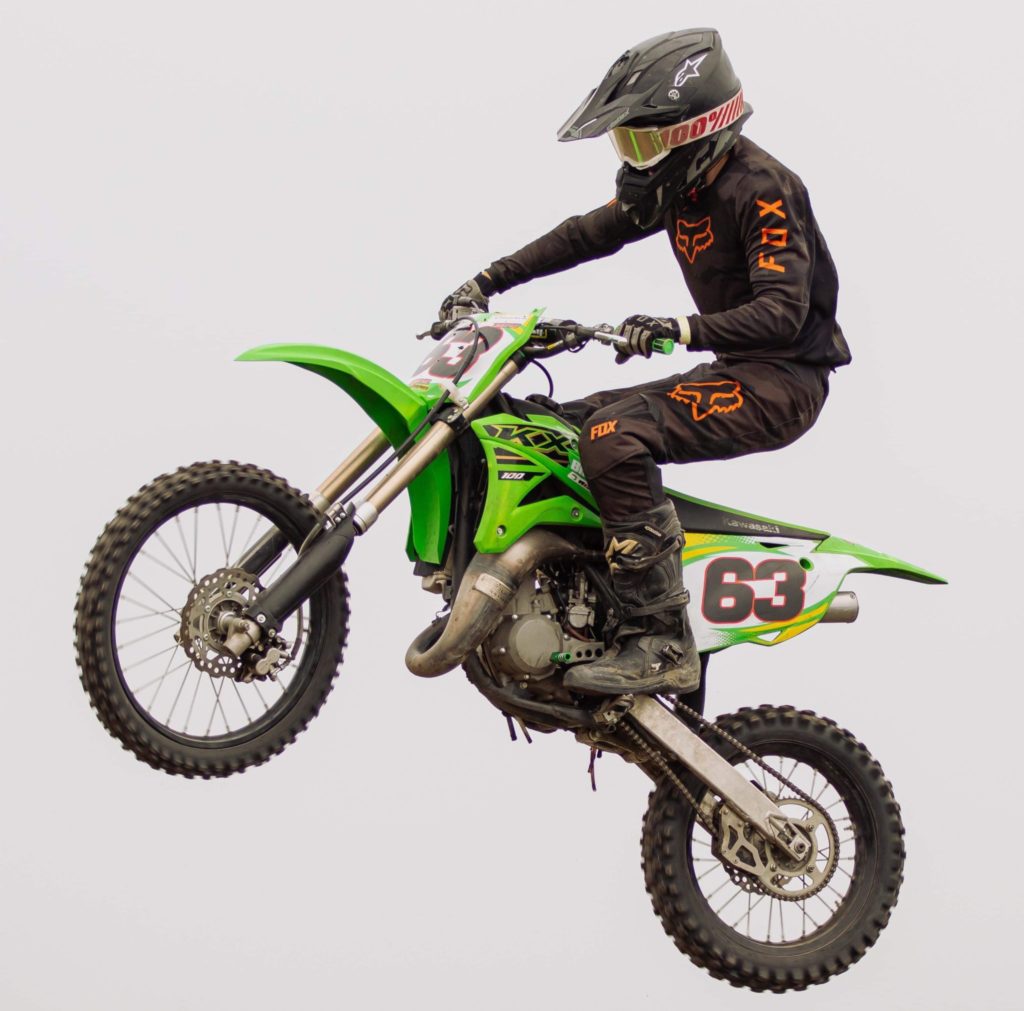 Rider on a green bike